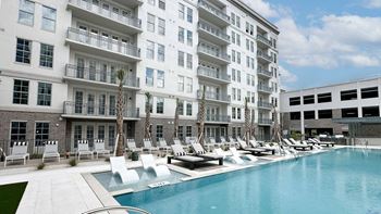 Pool with wet deck and cabanas